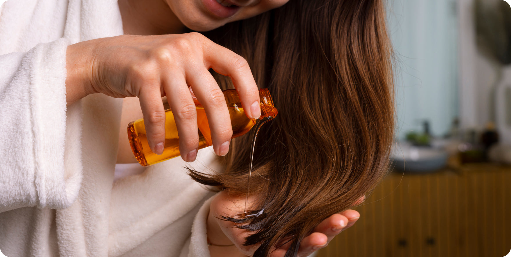 Warm a small amount of Spirulina Hair Oil, massage it onto your scalp for 5–10 minutes.